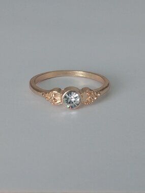 4/$20 Gold tone classic ring with centre imitation diamond crystal